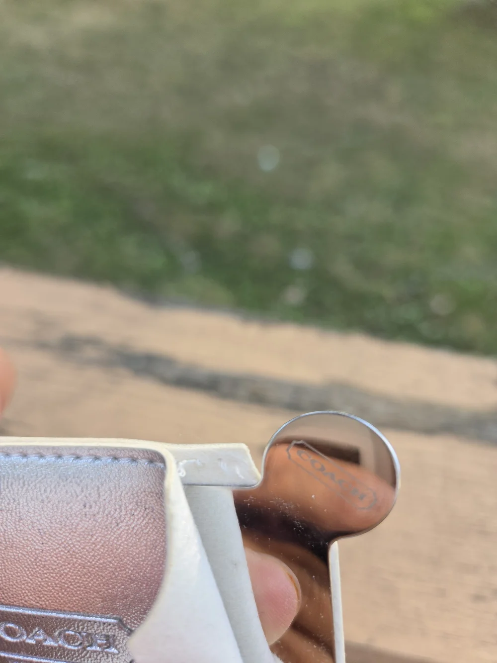 Coach loose thread